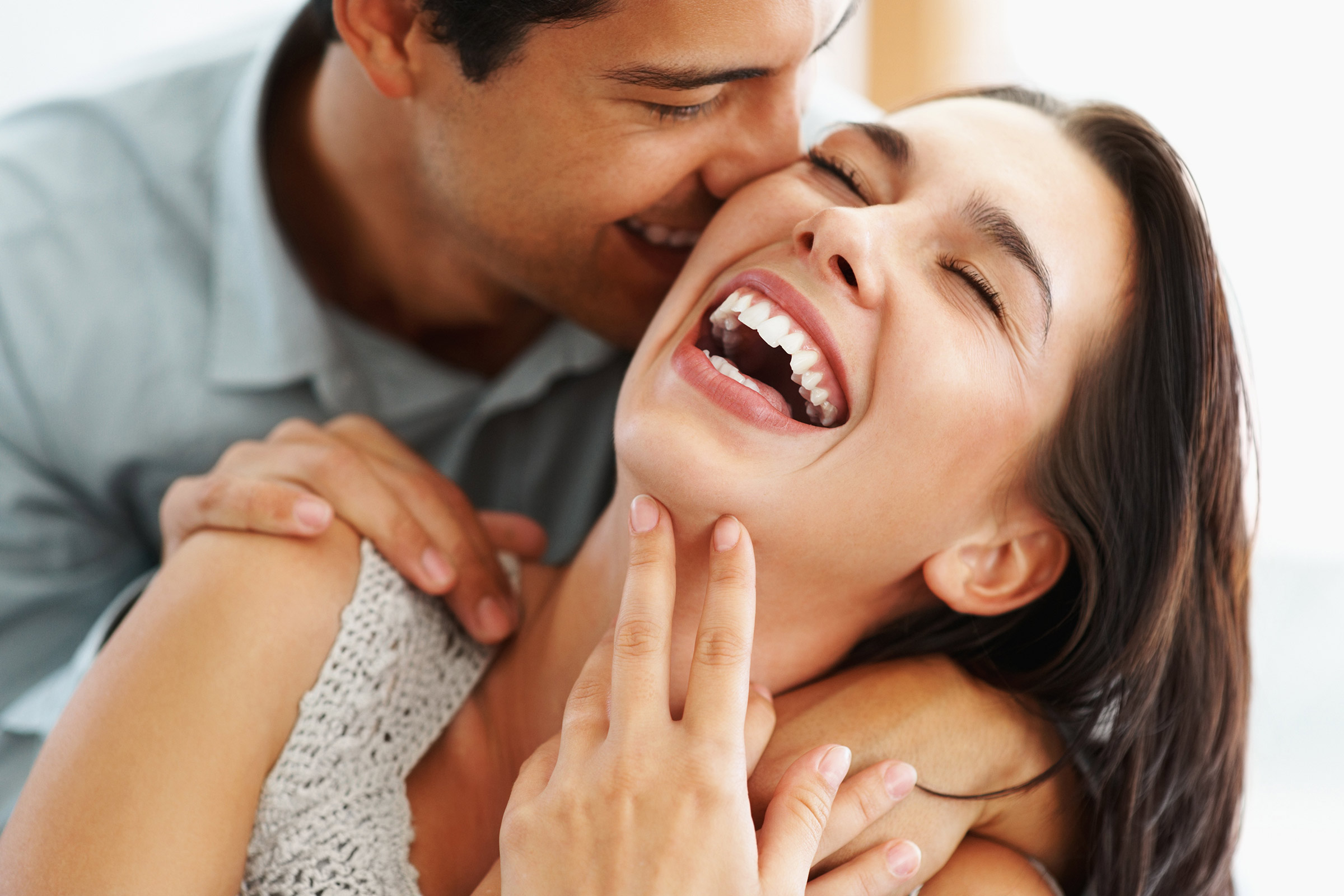 A couple laughing together